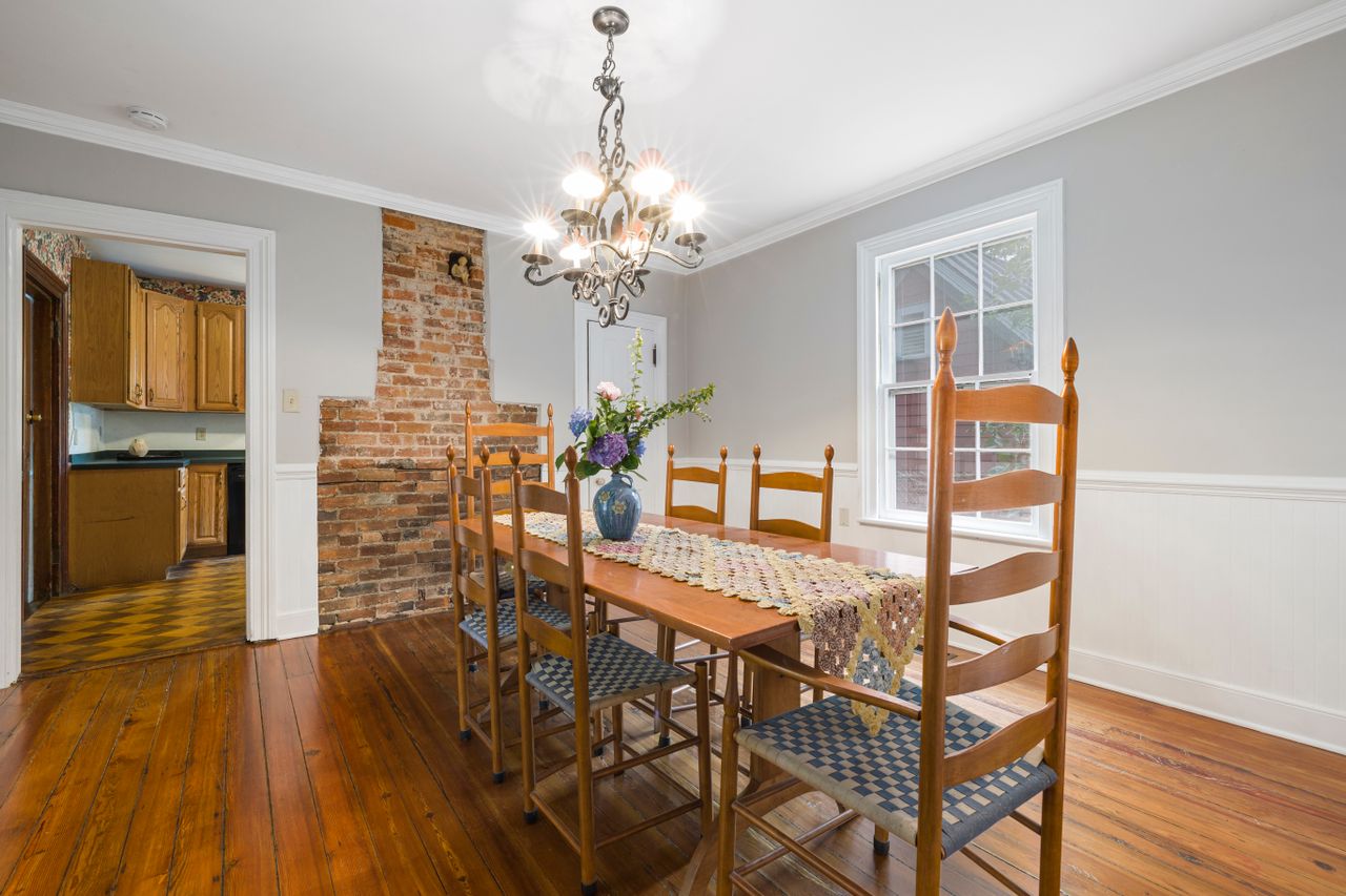 Dining Room with a chandelier